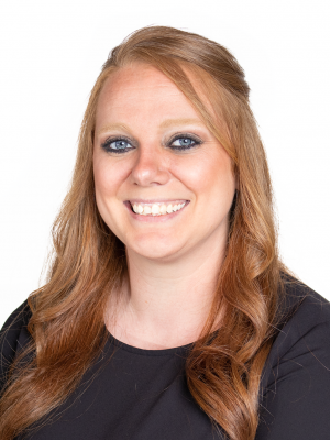 A professional headshot of Courtney Pendergrass, presenting a confident and approachable appearance.